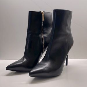 Michael Kors black zip high heeled booties